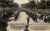 The funeral procession for Captain Beresford moves up Queen’s Avenue. Men of the Royal Engineers march with reversed arms.